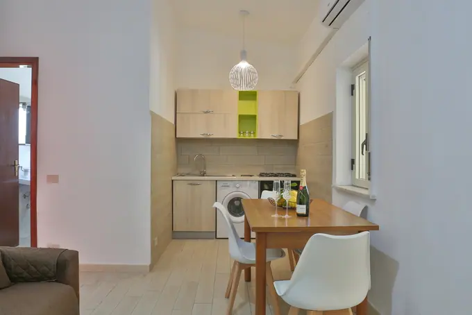 Zona giorno e cucina negli alloggi Paradise Beach — foto 9