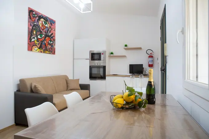 Zona giorno e cucina negli alloggi Paradise Beach — foto 13