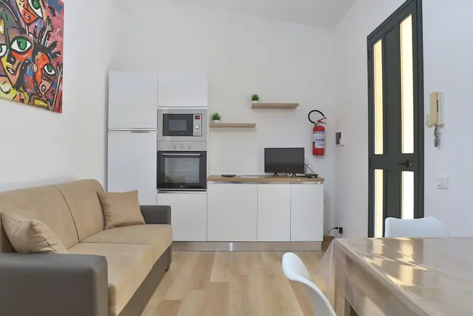Zona giorno e cucina negli alloggi Paradise Beach — foto 14